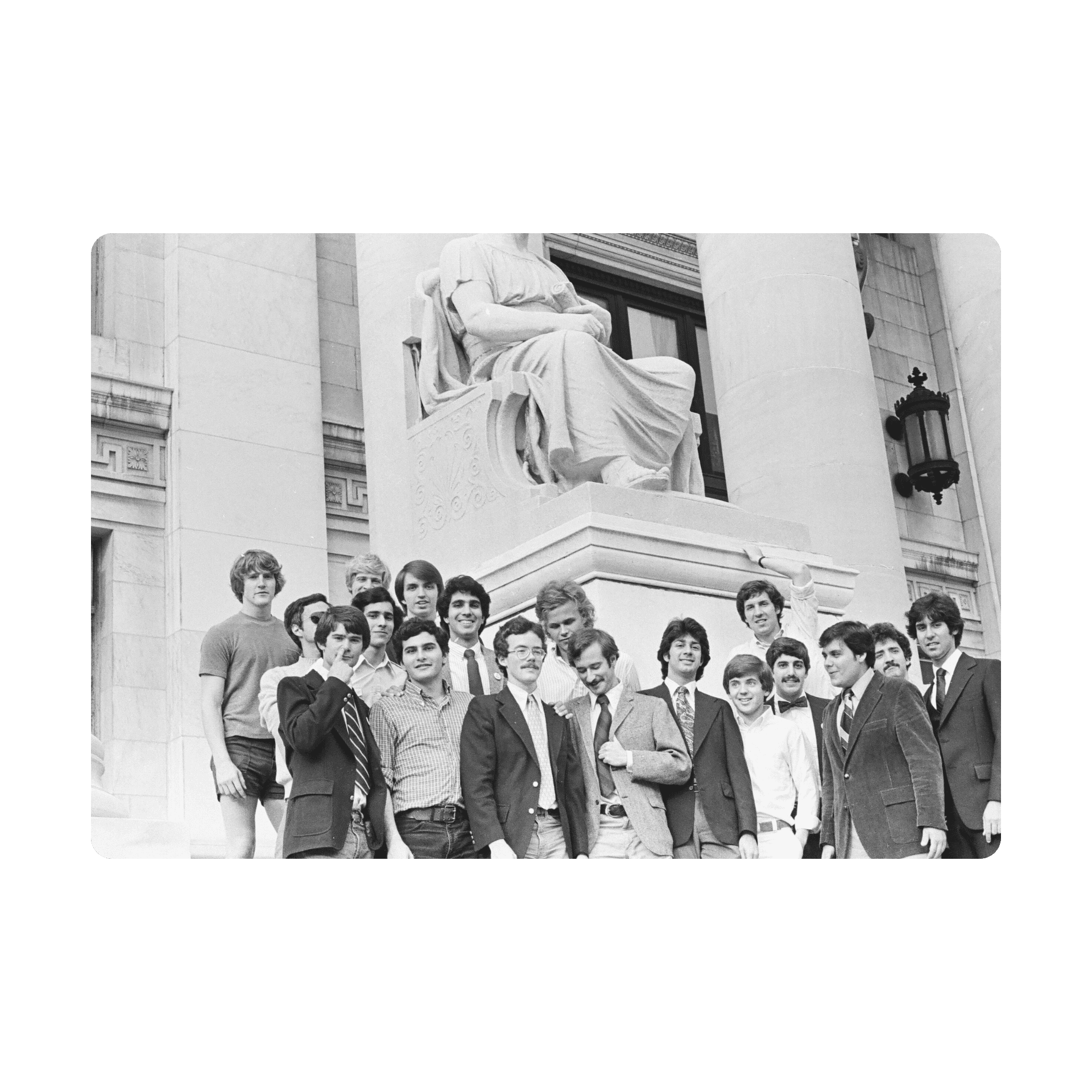 Historic Doox members gathered near a statue